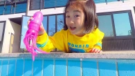 Boram and dad play with a water slide